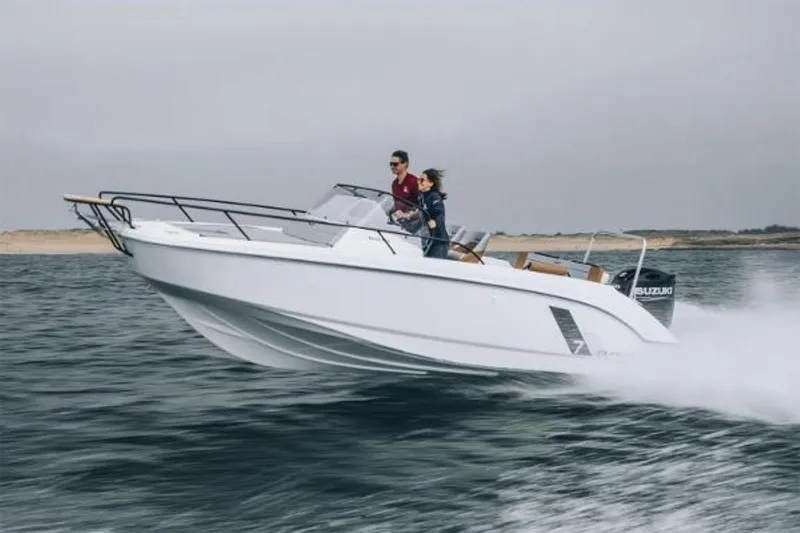 Slide: The Image of 2025 Beneteau Flyer 7 SUNdeck speeding on open water. - 7