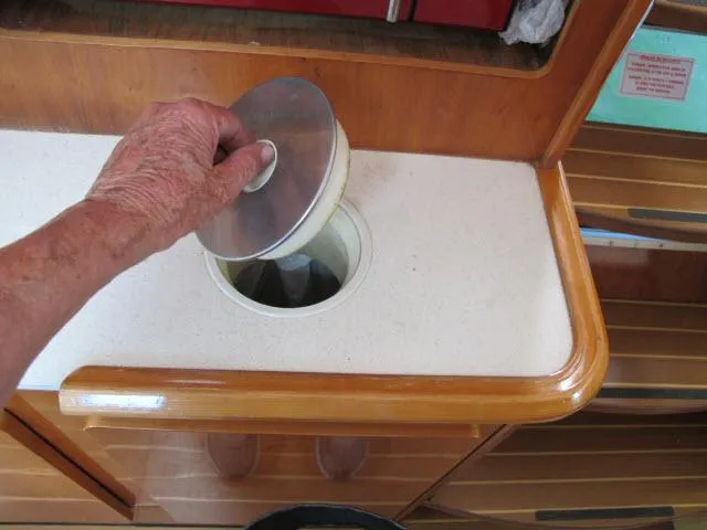 Slide: The Image of Hand opening compartment on 2000 Alliaura Privilege 37 yacht interior. - 16