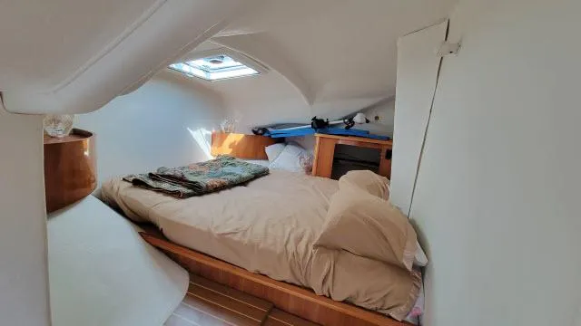 Slide: The Image of Cozy cabin interior of 2000 Alliaura Privilege 37 catamaran with bed and skylight. - 18