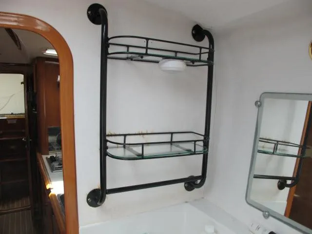 Slide: The Image of Bathroom shelf in 2000 Alliaura Privilege 37 yacht interior. - 23