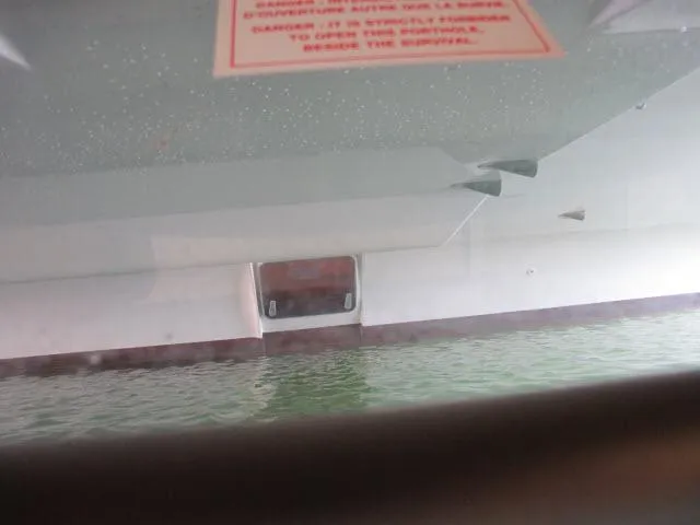 Slide: The Image of View of Alliaura Privilege 37 catamaran hull on water, 2000 model. - 24