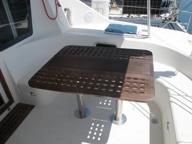Slide: The Image of Wooden table on Alliaura Privilege 37 catamaran deck, 2000 model. - 27