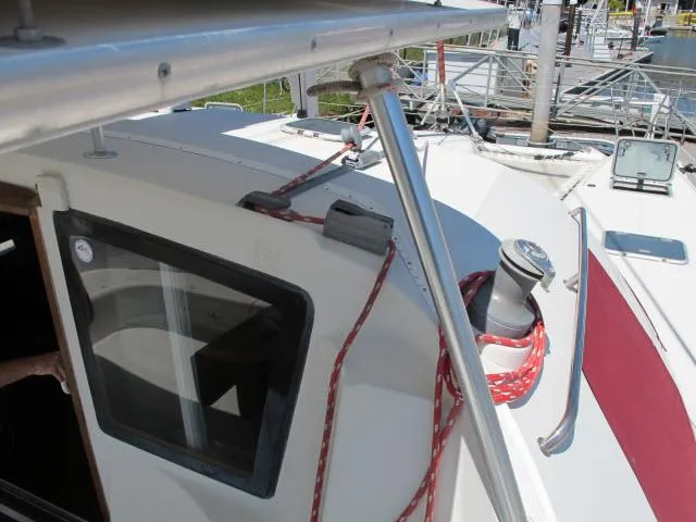 Slide: The Image of Alliaura Privilege 37 catamaran deck, 2000 model, featuring winch and red ropes. - 31