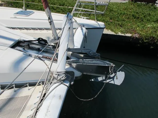 Slide: The Image of Alliaura Privilege 37 catamaran, 2000 model, docked with visible anchor and rigging. - 42