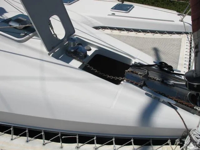 Slide: The Image of Alliaura Privilege 37 catamaran deck, anchor chain, and winch, 2000 model. - 43