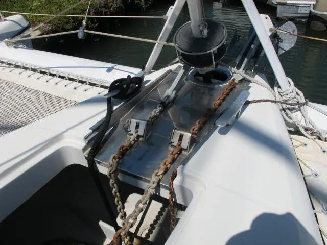Slide: The Image of Alliaura Privilege 37 catamaran deck with anchor chains, 2000 model. - 44