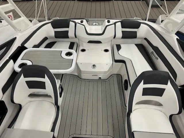 Slide: The Image of 2025 Yamaha Boats 195S interior with sleek seating and modern design. - 11