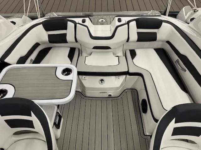 Slide: The Image of 2025 Yamaha Boats 195S interior with sleek seating and modern design. - 14