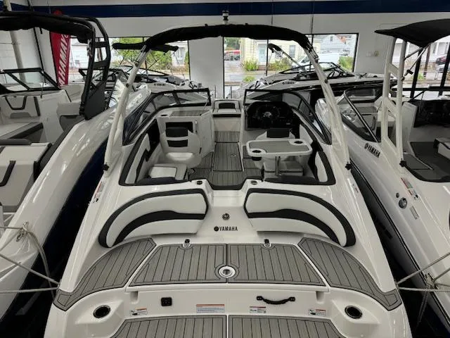 Slide: The Image of 2025 Yamaha Boats 195S interior, sleek design, spacious seating, modern features. - 2