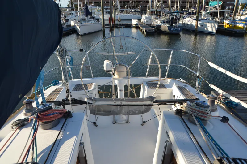 Slide: The Image of Beneteau First 36.7 sailboat cockpit, 2002 model, docked in a marina. - 15