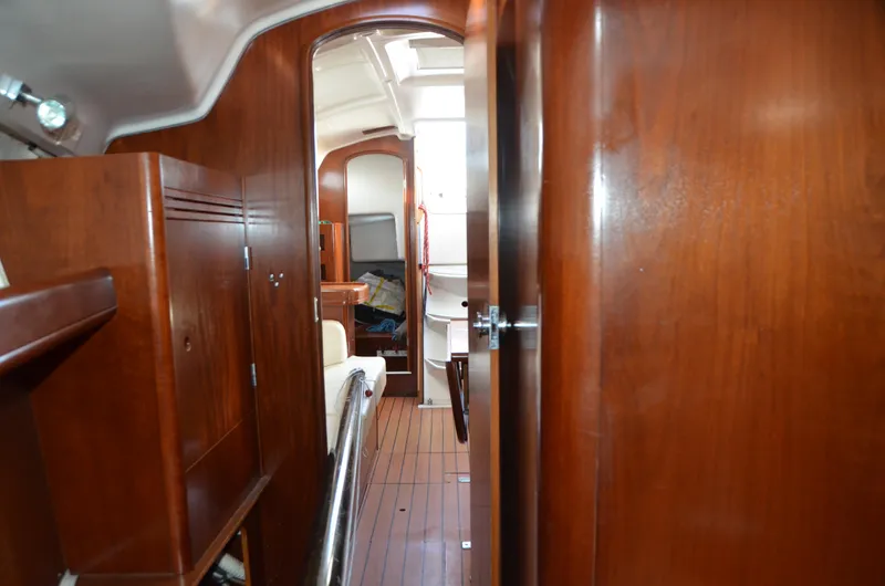 Slide: The Image of Interior view of 2002 Beneteau First 36.7 sailboat with wooden finish. - 18