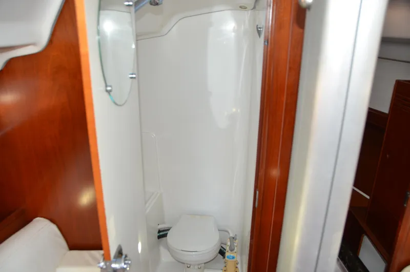 Slide: The Image of Interior of 2002 Beneteau First 36.7 yacht bathroom with wooden accents. - 19