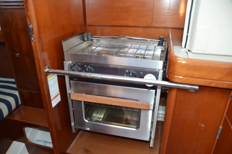 Slide: The Image of Galley stove and oven in 2002 Beneteau First 36.7 sailboat interior. - 27