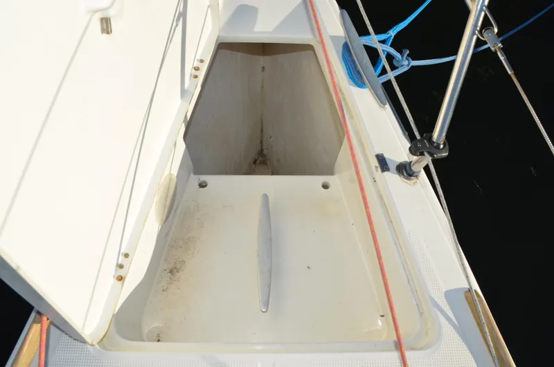 Slide: The Image of Open storage compartment on a 2002 Beneteau First 36.7 sailboat deck. - 8