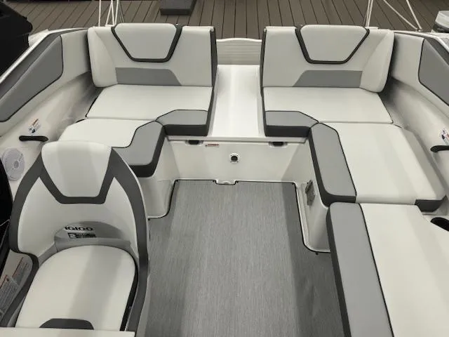 Slide: The Image of 2025 Yamaha Boats AR220 interior with modern seating and sleek design. - 10