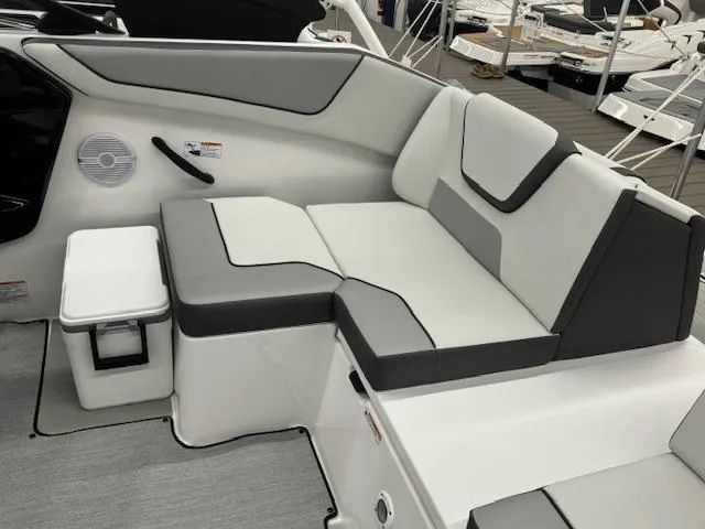 Slide: The Image of 2025 Yamaha Boats AR220 interior seating with modern design and comfortable upholstery. - 13