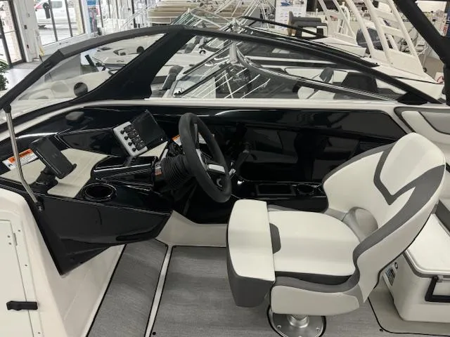 Slide: The Image of 2025 Yamaha Boats AR220 cockpit with modern steering and controls. - 5