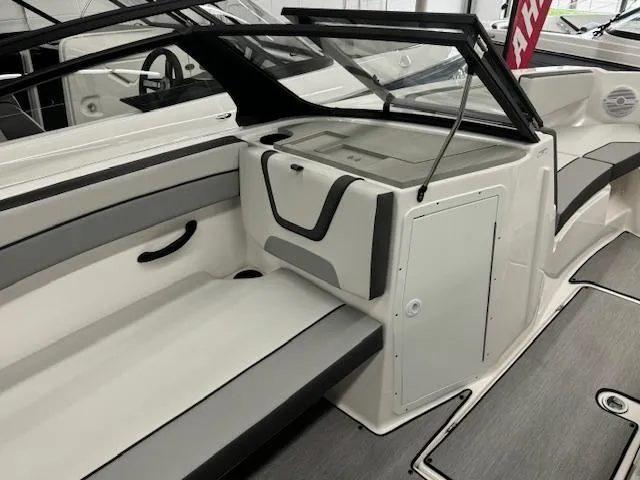 Slide: The Image of 2025 Yamaha Boats AR220 interior with sleek seating and modern design. - 8