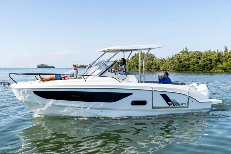 Slide: The Image of Beneteau Flyer 9 SUNdeck 2026 on calm water with passengers. - 1