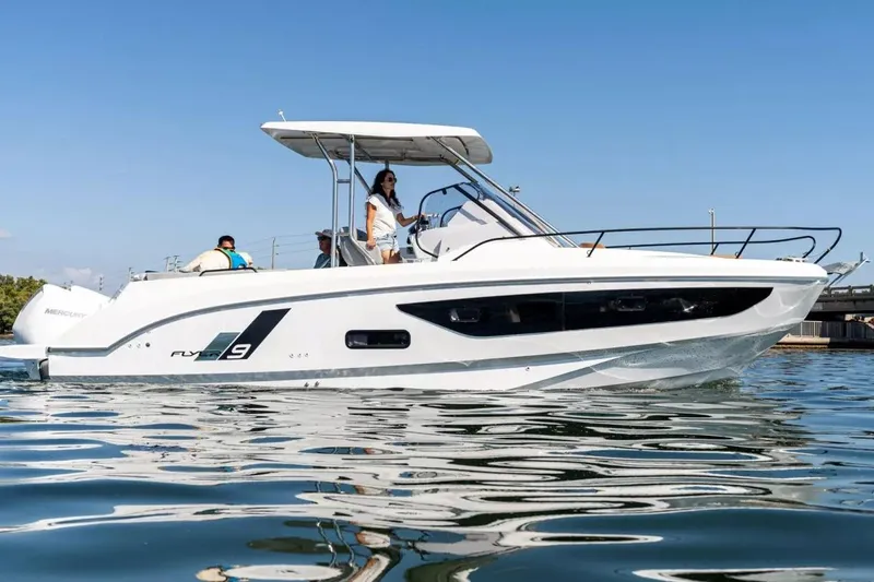 Slide: The Image of Beneteau Flyer 9 SUNdeck 2026 on calm water. - 4