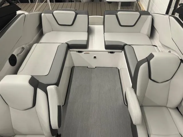 Slide: The Image of 2025 Yamaha Boats AR250 interior with modern seating and sleek design. - 11