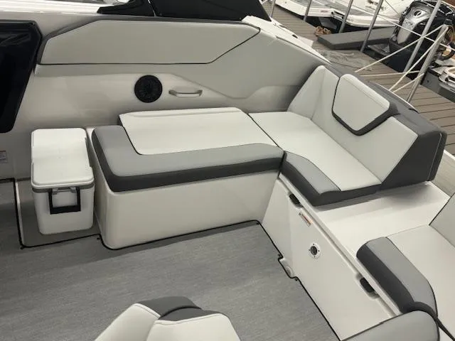 Slide: The Image of 2025 Yamaha AR250 boat interior with gray and white seating. - 14