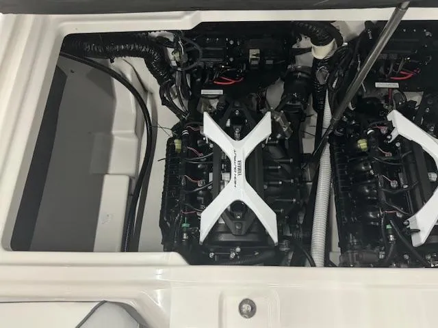 Slide: The Image of 2025 Yamaha AR250 engine compartment showcasing dual engines and wiring. - 16