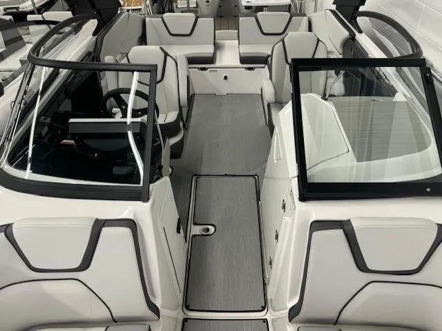 Slide: The Image of 2025 Yamaha Boats AR250 interior with modern seating and sleek design. - 3