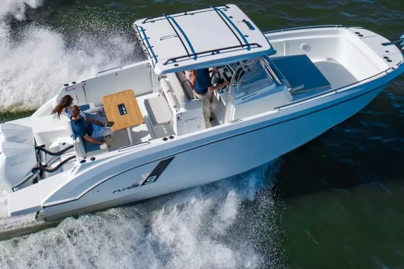 Slide: The Image of 2026 Beneteau Flyer 9 SPACEdeck cruising on water. - 1