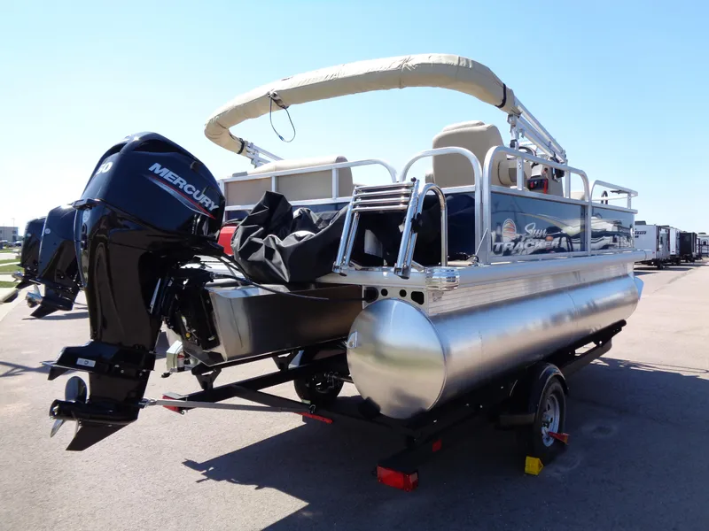 Slide: The Image of 2025 Sun Tracker Bass Buggy 16 XL Select pontoon boat with Mercury engine. - 2