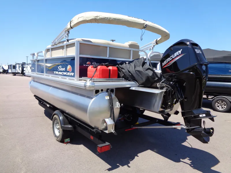 Slide: The Image of 2025 Sun Tracker Bass Buggy 16 XL Select pontoon boat with Mercury engine. - 3
