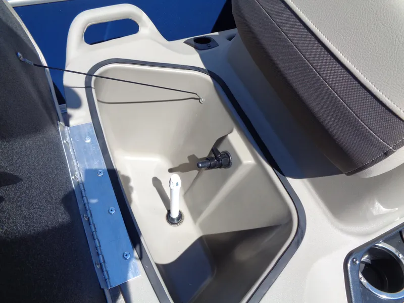 Slide: The Image of Sun Tracker Bass Buggy 16 XL Select 2025 boat storage compartment with seat and handle. - 8