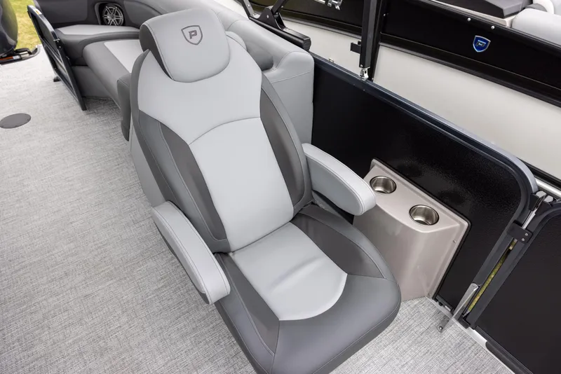 Slide: The Image of Luxurious seating in 2025 Premier 250 Solaris RF boat with cup holders. - 11