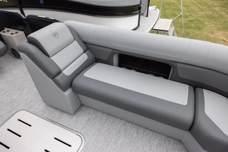 Slide: The Image of 2025 Premier 250 Solaris RF boat interior with gray seating and modern design. - 5