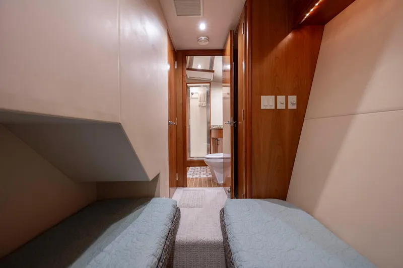 Slide: The Image of Interior cabin of 2005 Hatteras 54 Convertible yacht with twin beds. - 30