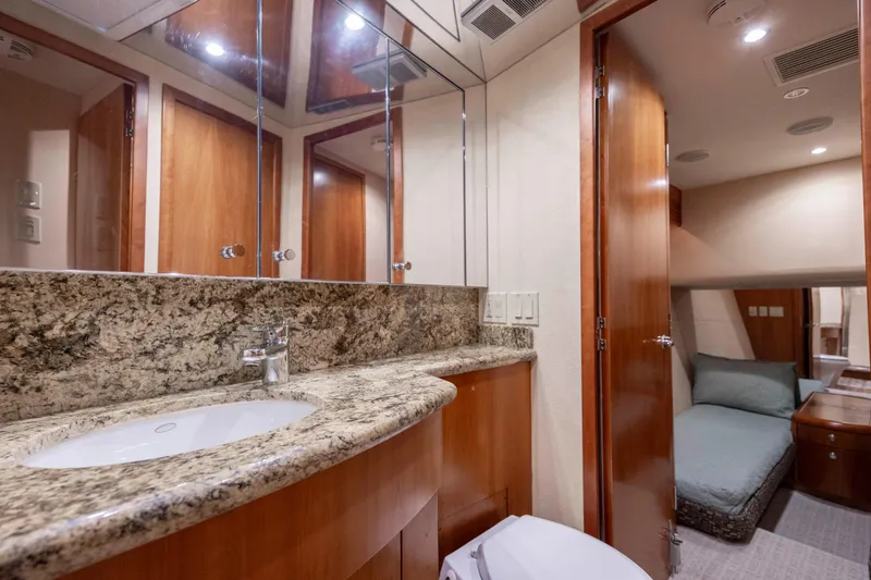 Slide: The Image of Luxurious bathroom and cabin interior of 2005 Hatteras 54 Convertible yacht. - 31