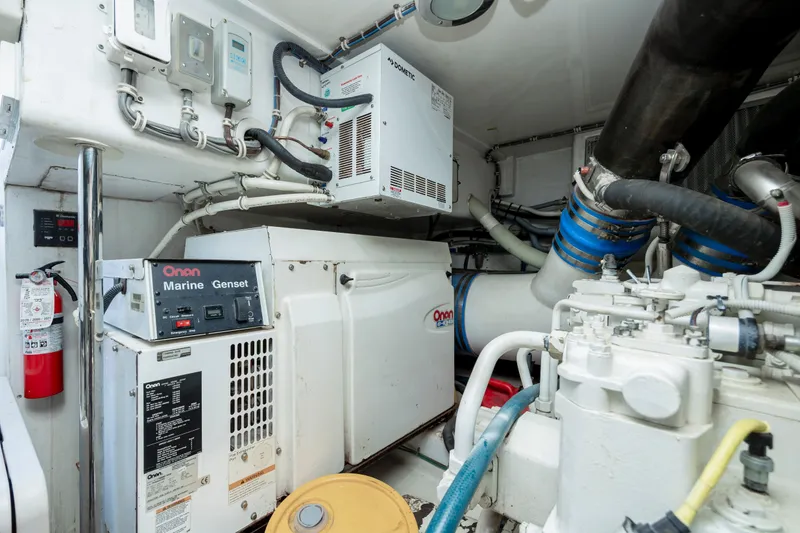 Slide: The Image of Engine room of 2005 Hatteras 54 Convertible with Onan marine generator. - 35