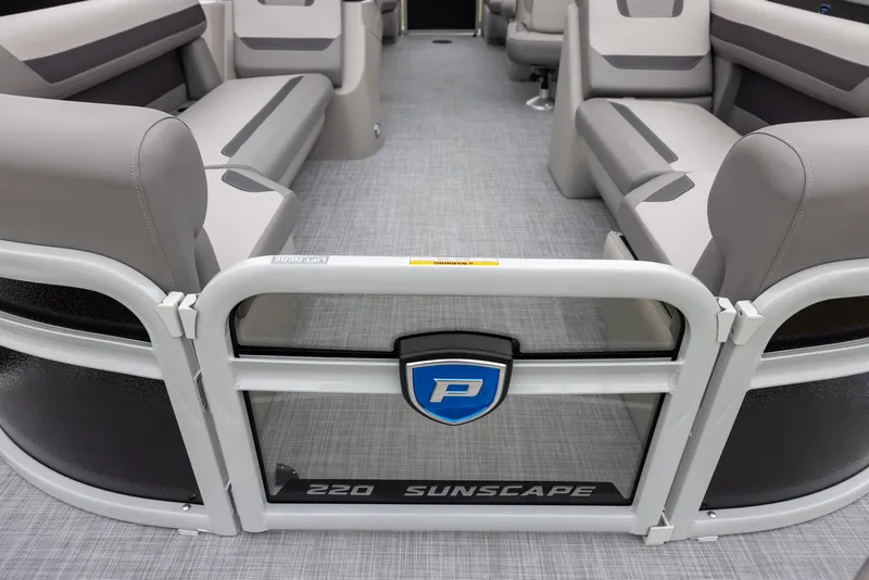Slide: The Image of 2025 Premier 220 Sunscape RF interior with gray seating and flooring. - 4