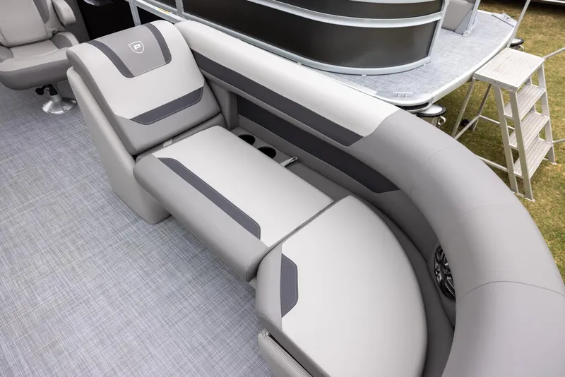 Slide: The Image of 2025 Premier 220 Sunscape RF boat interior with gray seating and modern design. - 5