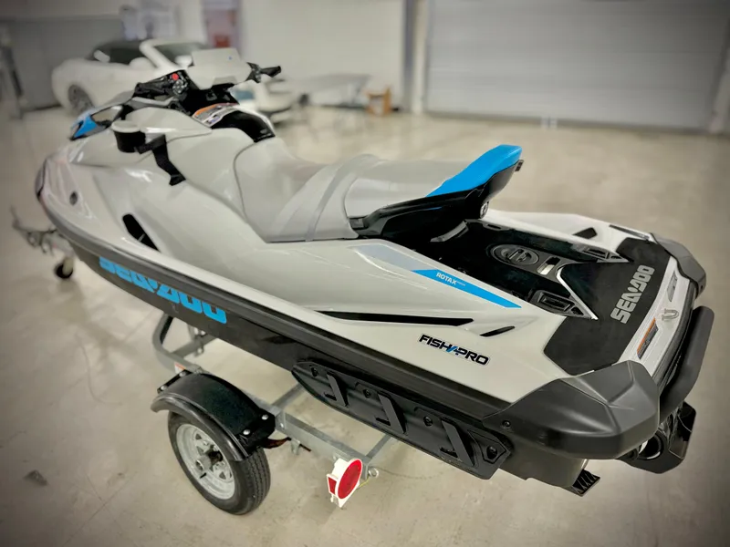 Slide: The Image of 2022 Yamaha WaveRunner Fish Pro Scout 130 on trailer in a garage. - 5