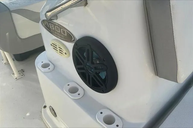 Slide: The Image of Key Largo 1800 CC 2021 boat console with speaker and cup holders. - 17
