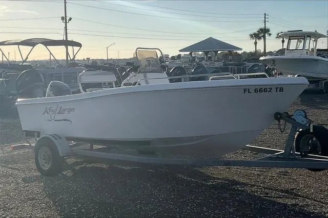 Slide: The Image of 2021 Key Largo 1800 CC boat on trailer, front view, registration FL 6662 TB. - 2
