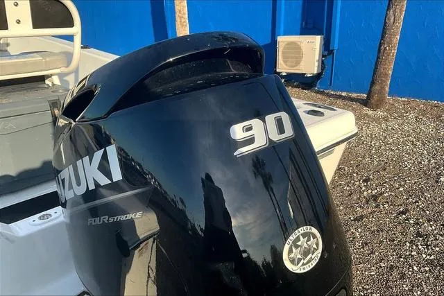 Slide: The Image of Suzuki 90 horsepower outboard motor on 2021 Key Largo 1800 CC boat. - 22