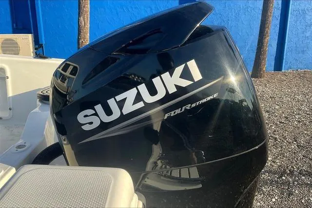 Slide: The Image of Suzuki four-stroke outboard motor on 2021 Key Largo 1800 CC boat. - 23