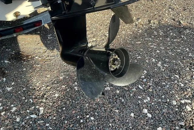 Slide: The Image of Propeller of 2021 Key Largo 1800 CC boat on gravel surface. - 25
