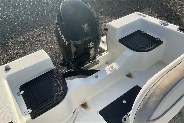 Slide: The Image of 2021 Key Largo 1800 CC boat with Suzuki outboard motor, rear deck view. - 27