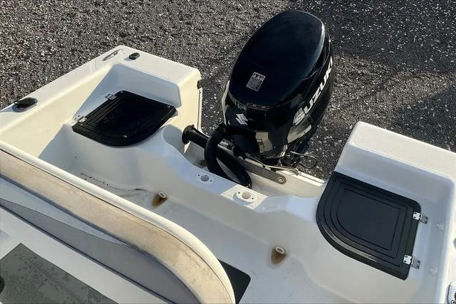Slide: The Image of 2021 Key Largo 1800 CC boat with Suzuki outboard motor, viewed from above. - 29