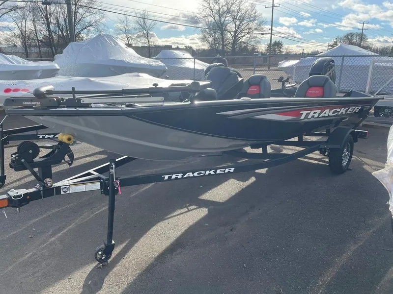 Slide: The Image of 2025 Tracker Pro Team 175 TXW® fishing boat on trailer, parked outdoors. - 4