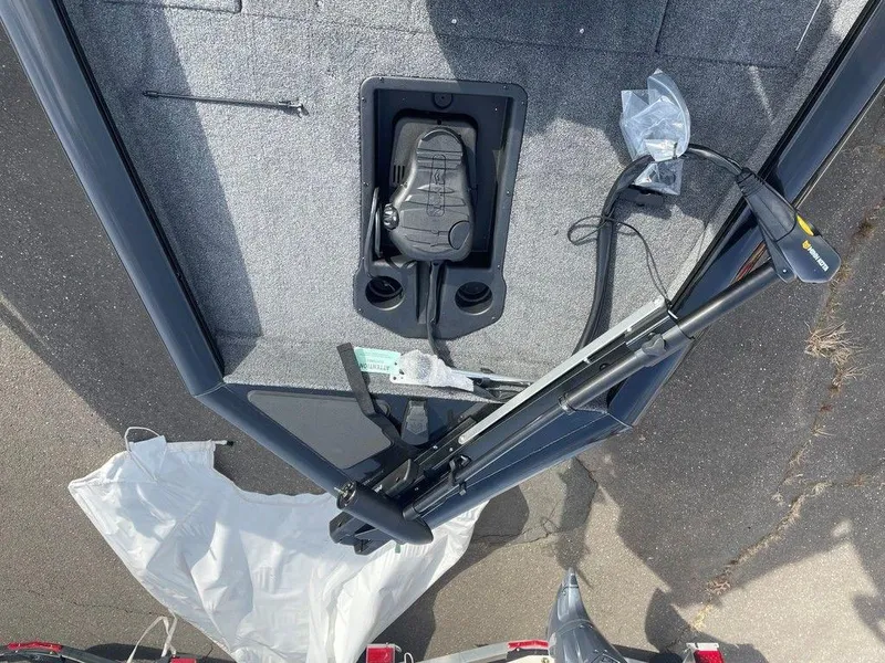 Slide: The Image of 2025 Tracker Pro Team 175 TXW® boat deck with trolling motor and foot pedal. - 6