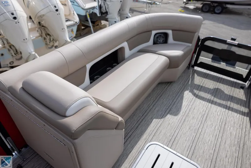 Slide: The Image of Premier 250 Solaris RF 2025 boat interior with beige seating and modern design. - 14